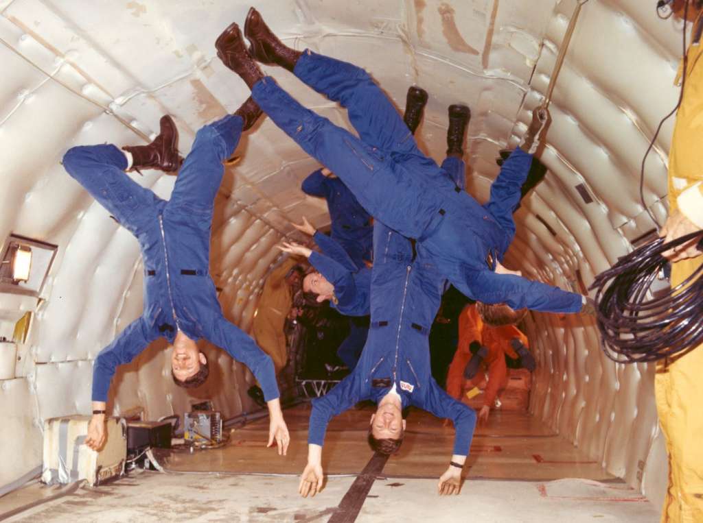 Astronauts in weightlessness state in the KC-135 Stratotanker.